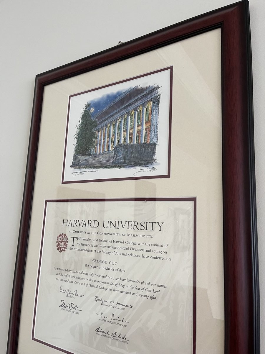 George's framed Harvard diploma